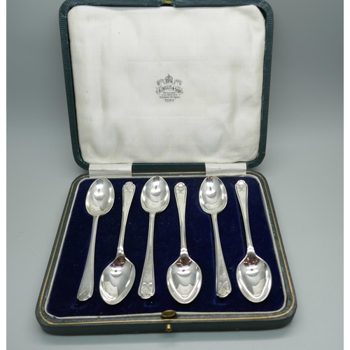 888 - A set of six silver golf spoons, 80g