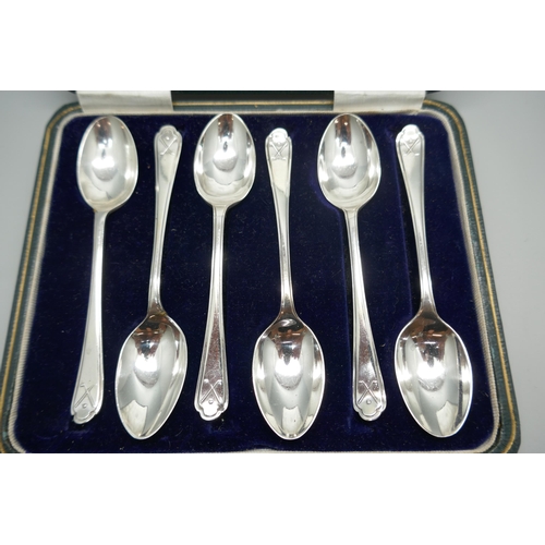 888 - A set of six silver golf spoons, 80g