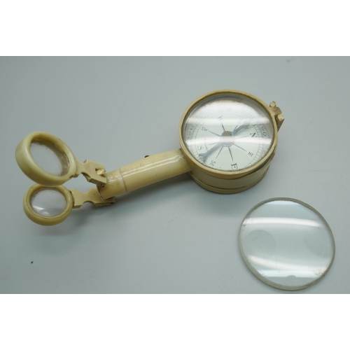 891 - An antique travelling compass, marked Bavaria, a/f, lens frame requires repair