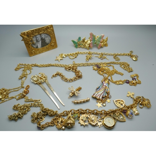 898 - A collection of Kirks Folly USA designer necklaces, picture frame, hair slides, brooches, charm brac... 