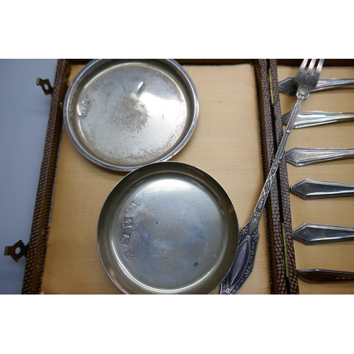 906 - Two small circular silver dishes, two boxed silver napkin rings, boxed set of six silver handled kni... 