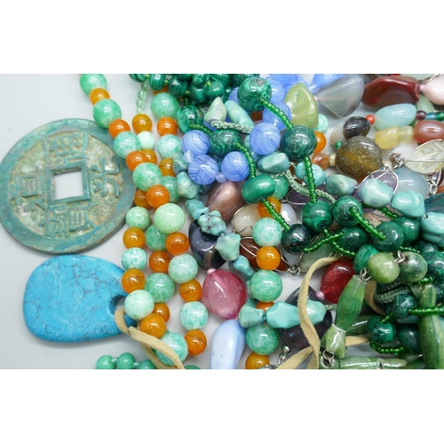 919 - A collection of gemstone bead necklaces including malachite and quartz