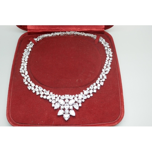 923 - A diamond simulant and silver necklace