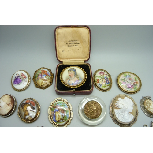 948 - Brooches including a Limoges plaque, cameo brooches, pendants, etc.