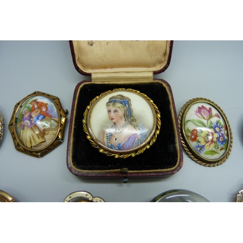 948 - Brooches including a Limoges plaque, cameo brooches, pendants, etc.