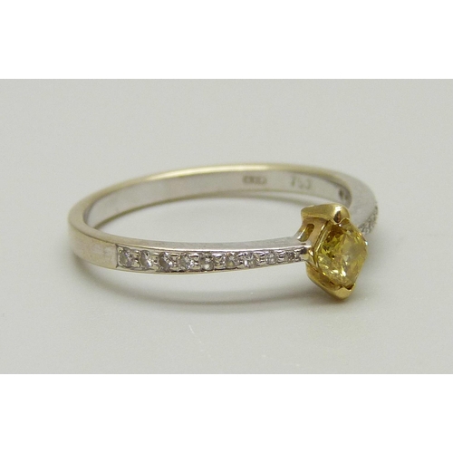 967 - An 18ct gold ring set with a yellow diamond and diamond shoulders, 1.8g, N