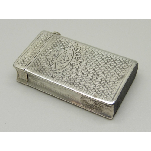 986 - A continental silver vesta case in the form of a book, with control marks, (tests as silver)