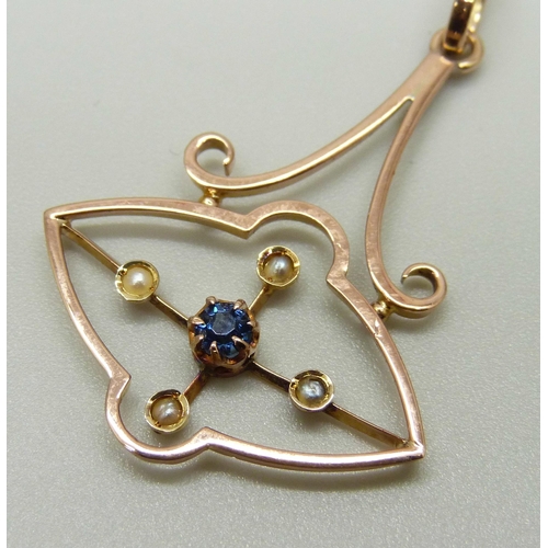 988 - An Edwardian 9ct gold, blue stone and pearl pendant, marked 9ct on loop, 1.4g, 24mm wide