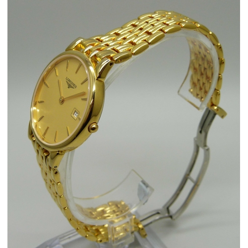 989 - A Longines La Grande Classique dress wristwatch with plated Longines bracelet strap