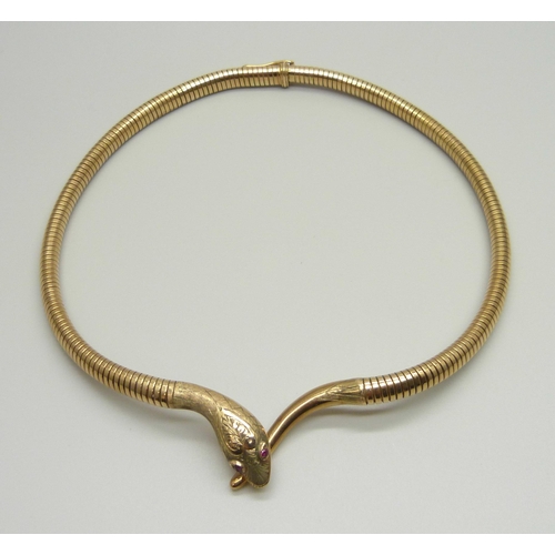 994 - A hallmarked 9ct gold snake necklet, the eyes set with rubies, Birmingham 1957, C&F, 31g, 36.5cm