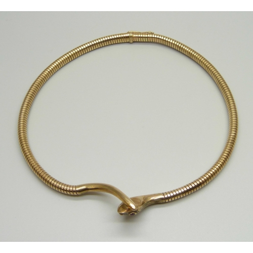 994 - A hallmarked 9ct gold snake necklet, the eyes set with rubies, Birmingham 1957, C&F, 31g, 36.5cm