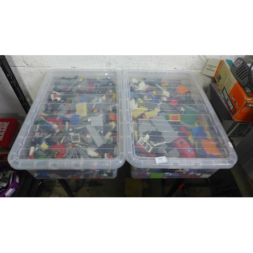 2083 - 2 large plastic trays of assorted Lego bricks