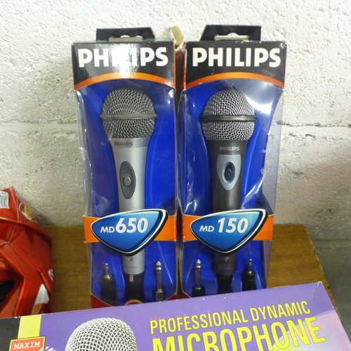 2084 - An assortment of microphones including two Maxim Audio Professional Dynamic microphones, a Philips M... 