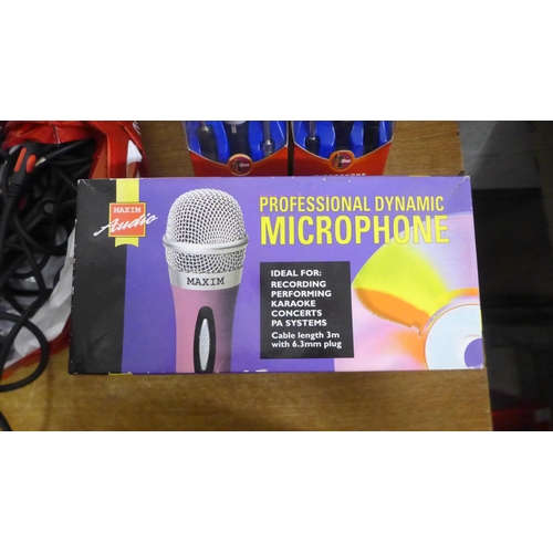 2084 - An assortment of microphones including two Maxim Audio Professional Dynamic microphones, a Philips M... 