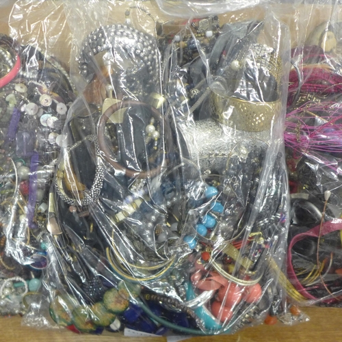 2118 - Three bags containing a large quantity of costume jewellery approx. 4kg per bag