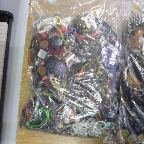 2118 - Three bags containing a large quantity of costume jewellery approx. 4kg per bag