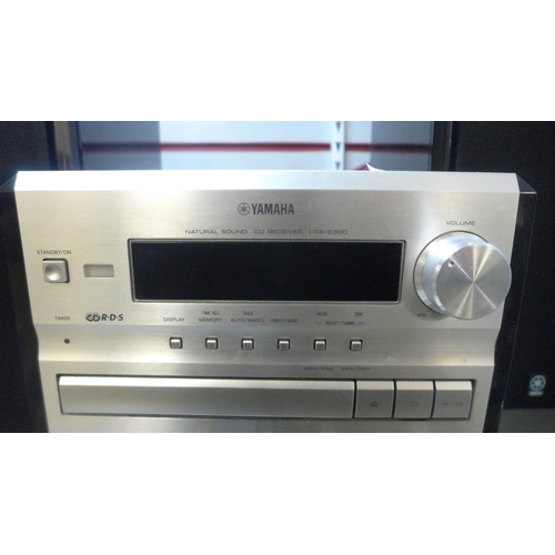 2127 - A Yamaha (CRX-E300) Natural Sound CD receiver music system with pair of matching speakers