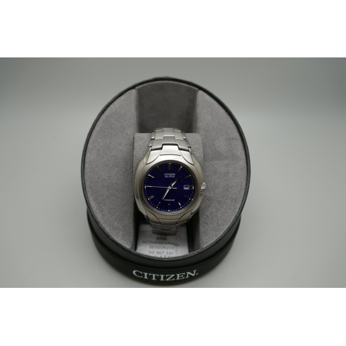 2153 - A men's Citizen Eco-Drive silver titanium wristwatch with blue dial and bracelet strap * this lot is... 