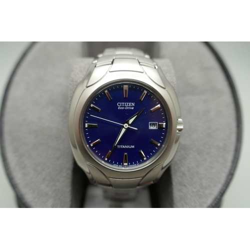 2153 - A men's Citizen Eco-Drive silver titanium wristwatch with blue dial and bracelet strap * this lot is... 