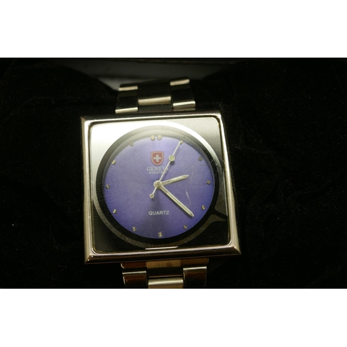 2154 - A Geneva square face stainless steel quartz wristwatch in presentation box