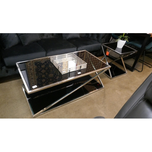 1321 - A chrome and black glass coffee table and lamp table * this lot is subject to VAT