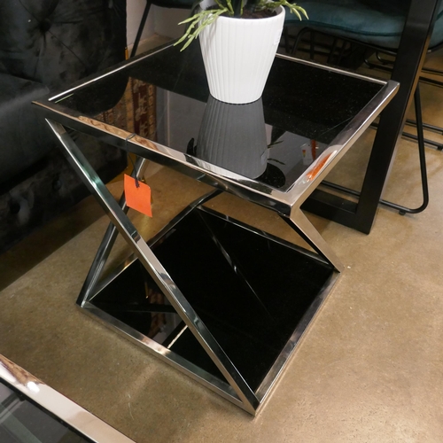 1321 - A chrome and black glass coffee table and lamp table * this lot is subject to VAT