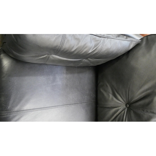 1481 - A black leather three seater sofa