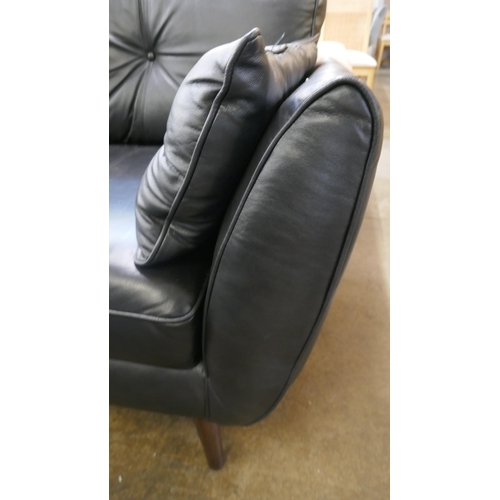 1481 - A black leather three seater sofa