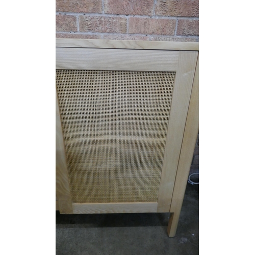 1490 - A large rattan sideboard