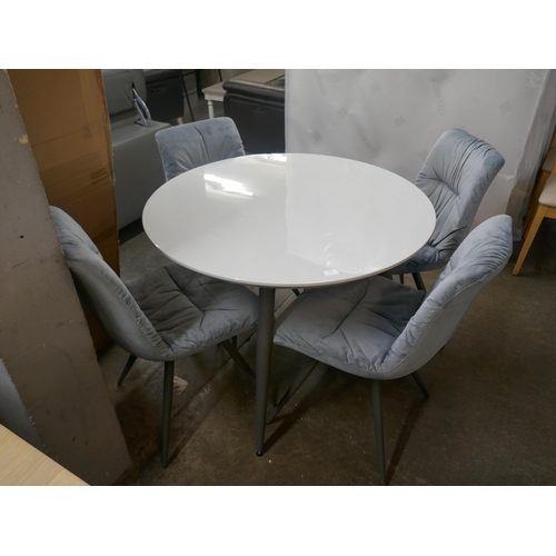 1496 - A Logan circular dining table and four grey velvet chairs