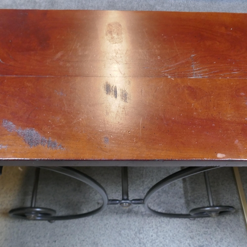 1540 - A cherrywood and steel console table and a pair of lamp tables