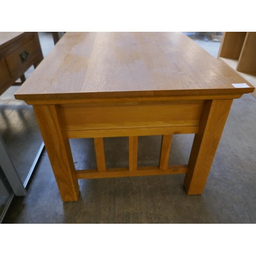 1545 - An Oak two drawer coffee table