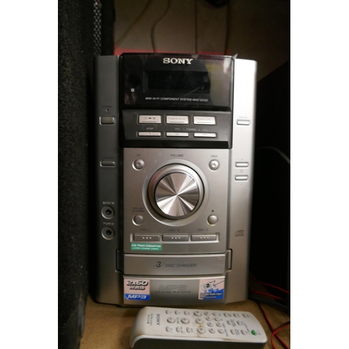 2165 - A Sony mini hi-fi component system (MHC-EC50) with a pair of Sony speakers (SS-EC50) plus remote