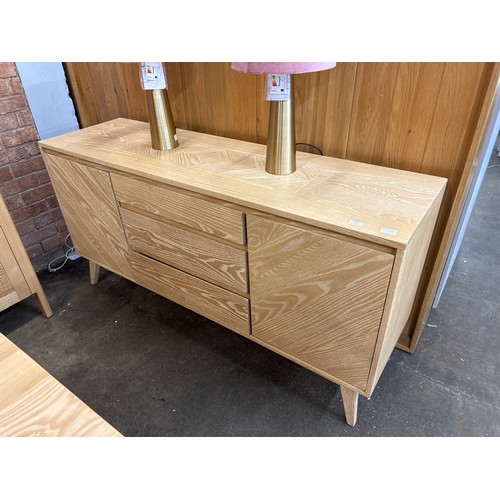 1487 - A two door, three drawer sideboard with split top