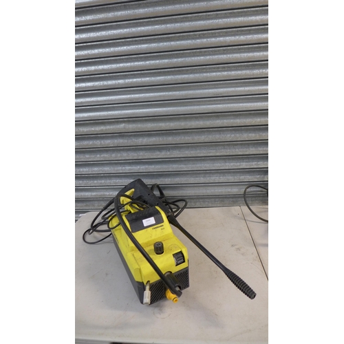 2349 - Two Karcher jet washers:- Karcher 400 with hose and lance, and Karcher 580 with hose and lance