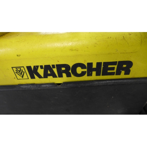 2349 - Two Karcher jet washers:- Karcher 400 with hose and lance, and Karcher 580 with hose and lance