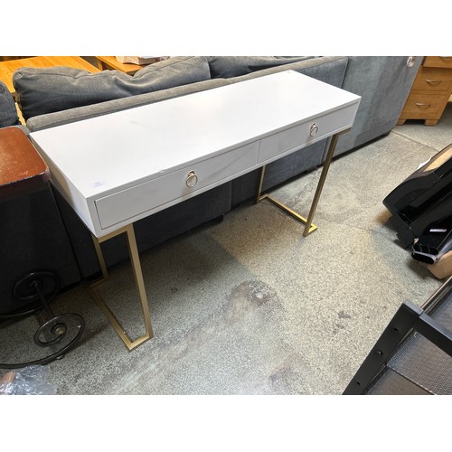 1541 - A white two drawer console table with gold legs