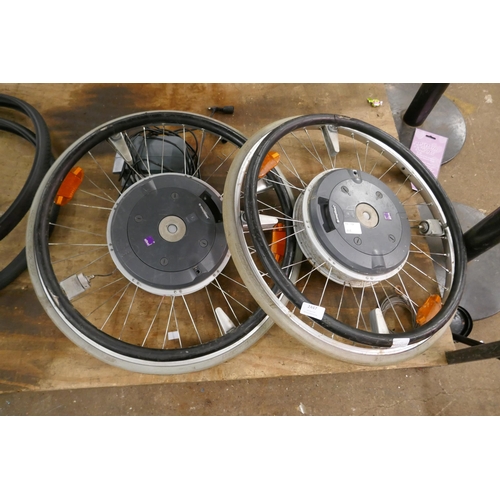 2447 - A set of Alber e-Motion electrically assisted wheelchair wheels and charger