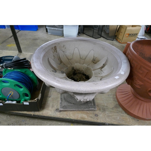 2468 - A large faux stone plastic garden planter