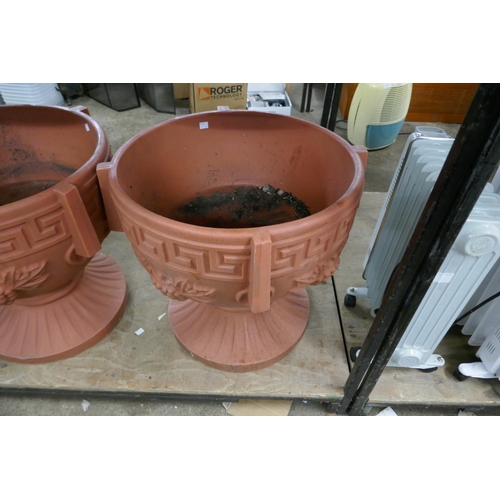 2470 - A pair of large plastic garden planters