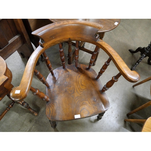 101 - A Victorian elm and beech smoker's bow chair