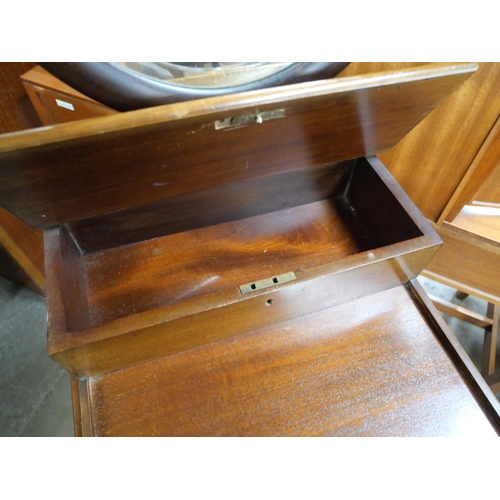 106 - A late Victorian mahogany gentleman's shaving stand, manufactured by Thos. Wallis, Holborn Circus, L... 