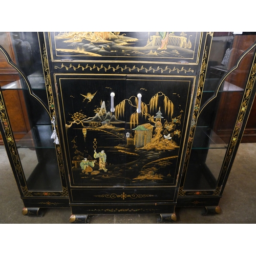 108 - An Art Deco black Japanned cocktail cabinet