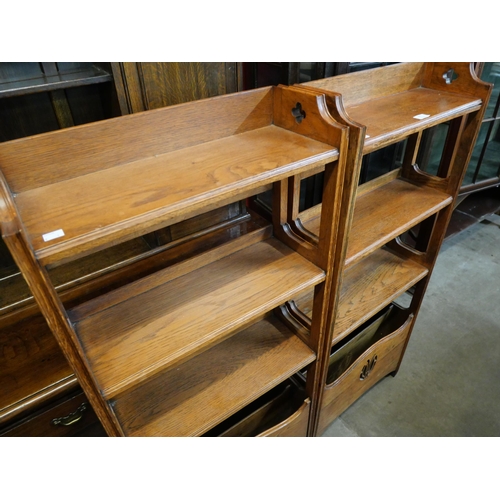 109 - A pair of Arts and Crafts oak open bookcases