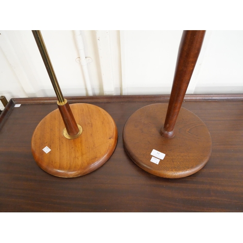 13 - Two teak standard lamps