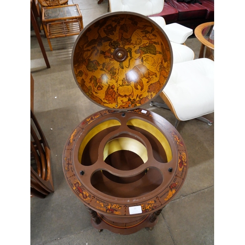 21 - An Italian terrestrial globe cocktail cabinet/trolley