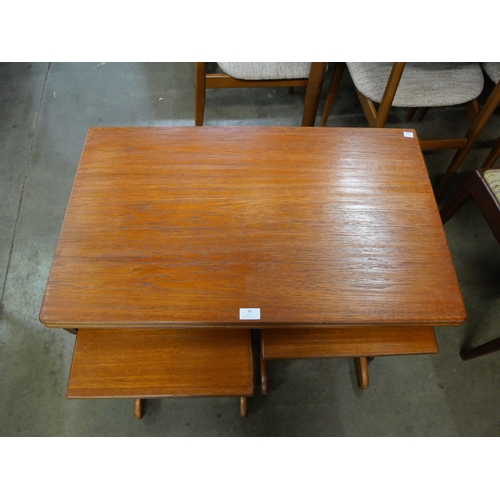 36 - A Jentique teak fold-over nest of tables