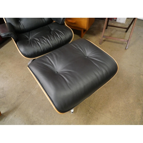 4 - A Charles & Ray Eames style simulated rosewood and black leather revolving lounge chair and ottoman