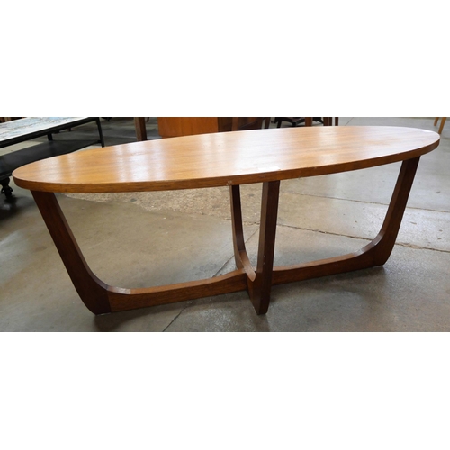 46 - An oval teak coffee table