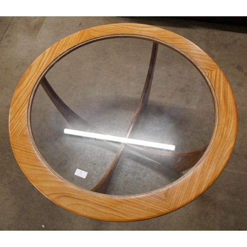 5 - A G-Plan Astro teak and glass topped circular coffee table